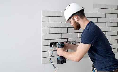 electricians in lantana fl installing electrical sockets